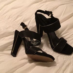 Black shoes with gold trimming